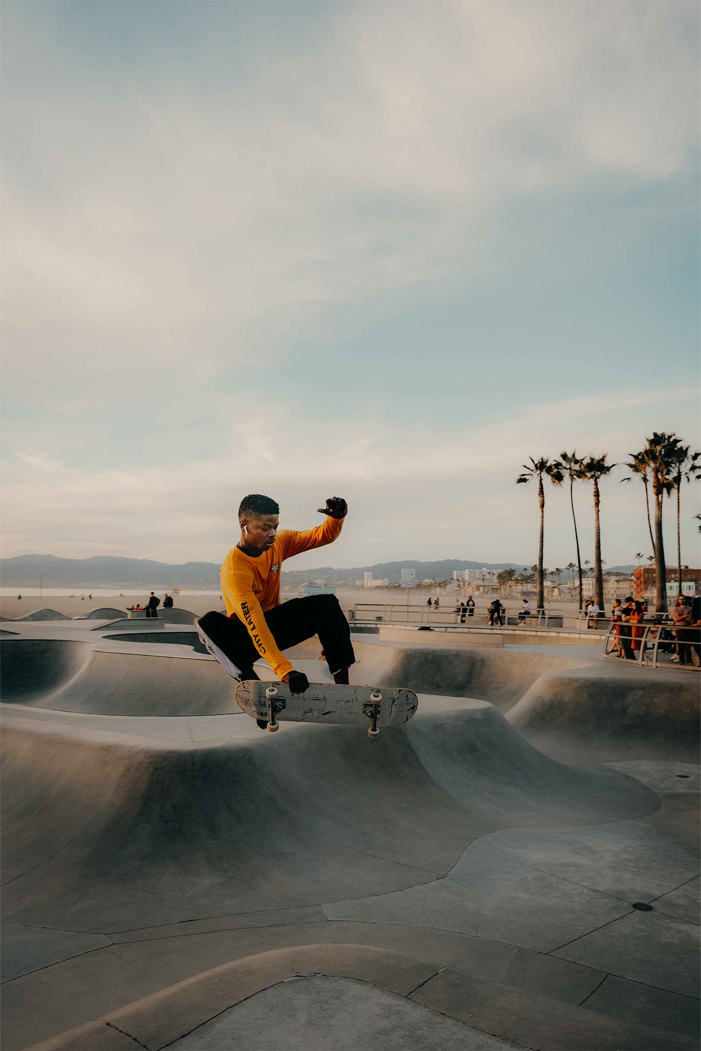 A skater finessing his Frontside Air at the Venice Beach Skatepark in LA, USA. Fine art photography print by Hannes Kläger, available to purchase on The Lost Works gallery.