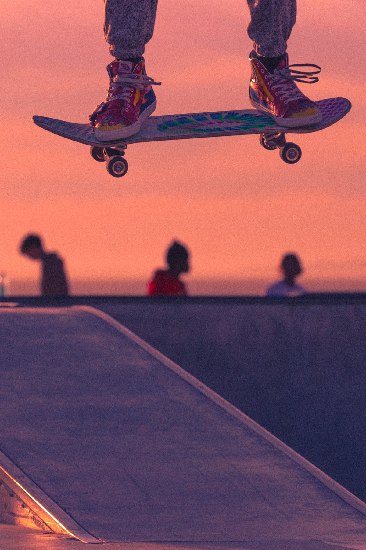 Skater mid-air performing a trick at Venice Skatepark during golden hour, captured in vibrant detail by photographer Craig Hubbard – fine art print titled ‘AIRLINE'