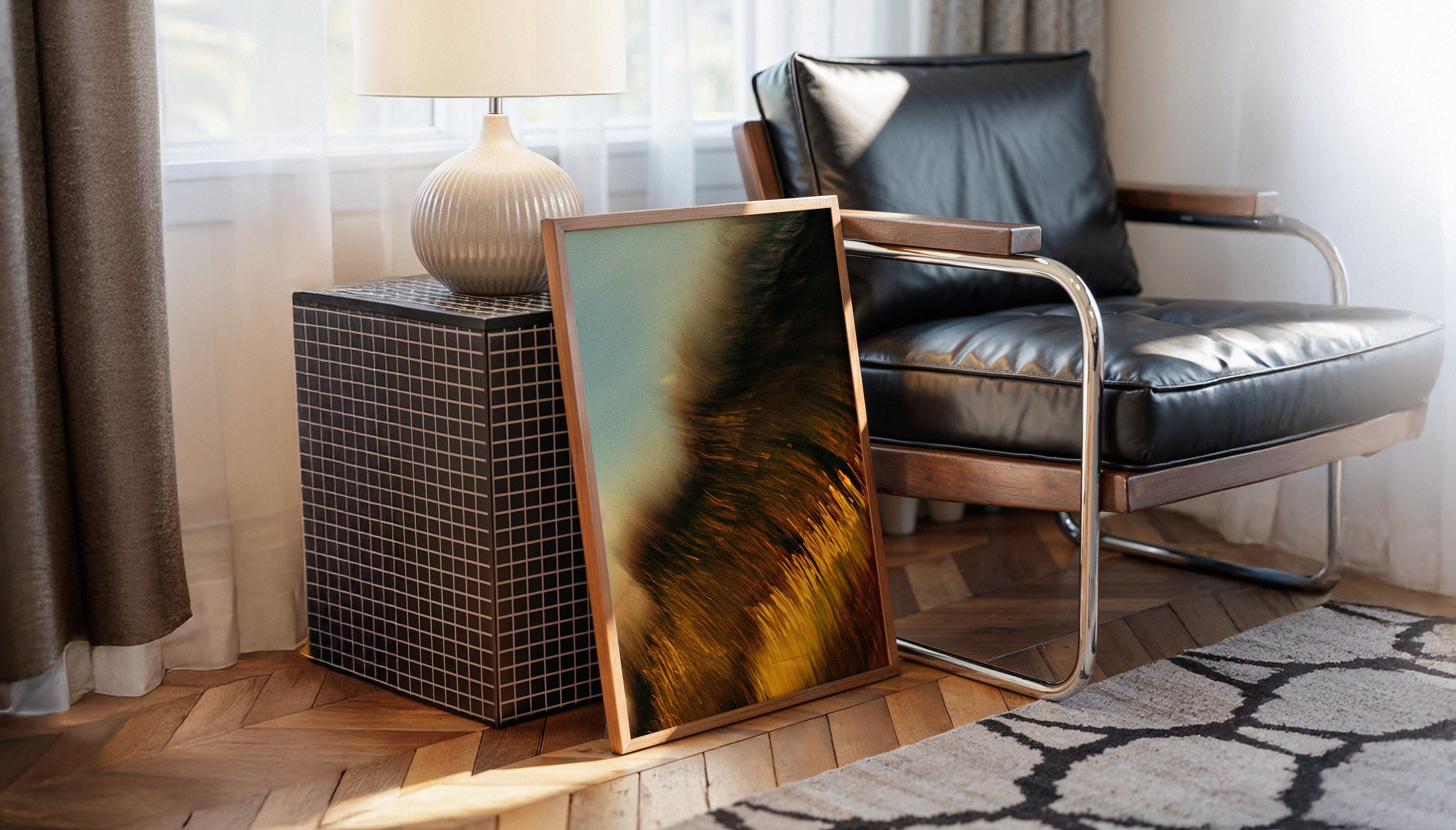 BREAKING by Ez Rivero styled in a contemporary interior. The framed print leans casually against a side table beside a leather chair, with soft natural light filtering through sheer curtains.