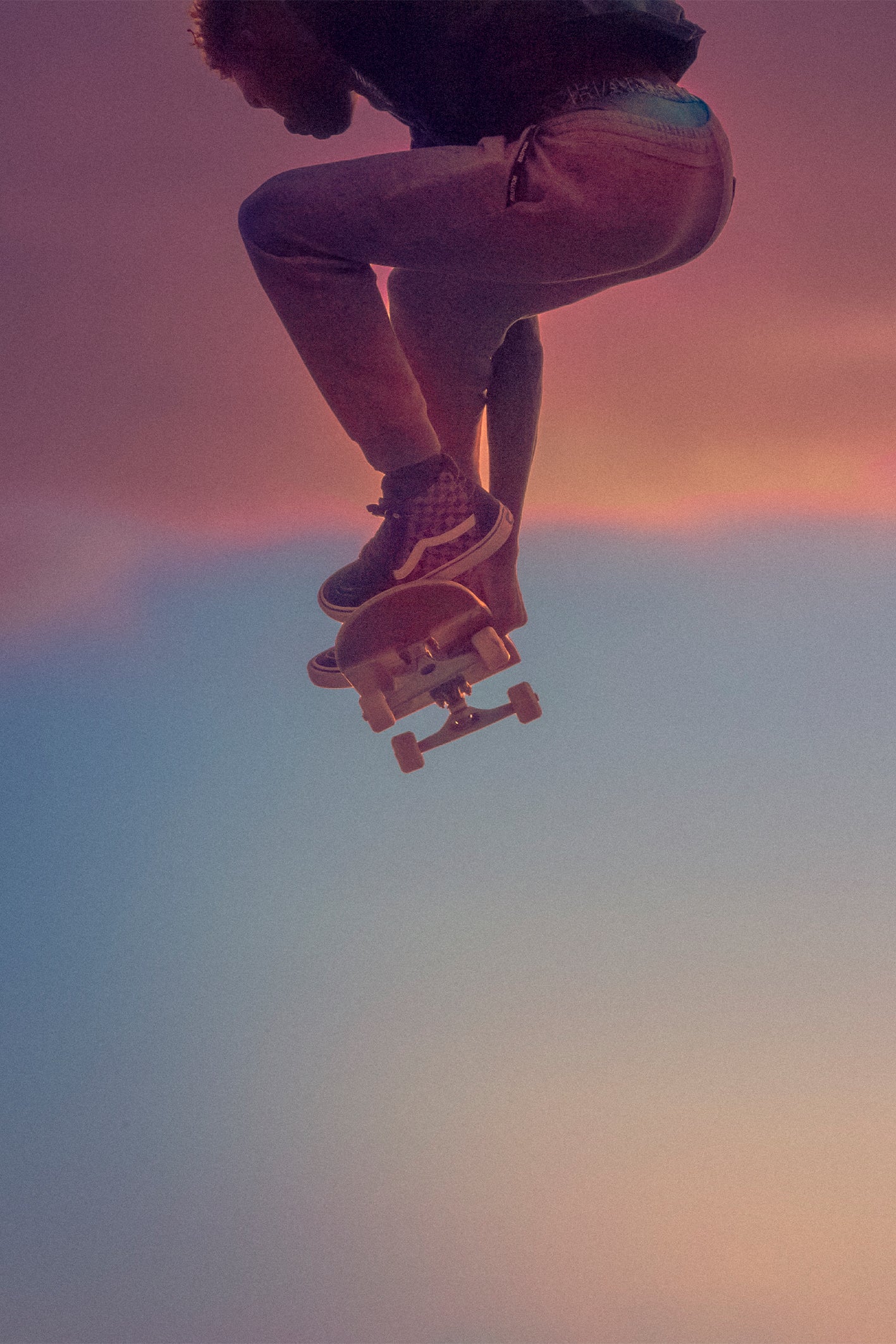 Fine art skateboard photography print of a skater mid-air at Venice Skatepark by Craig Hubbard, silhouetted against a pastel sunset sky – modern wall art for urban and action sports lovers.