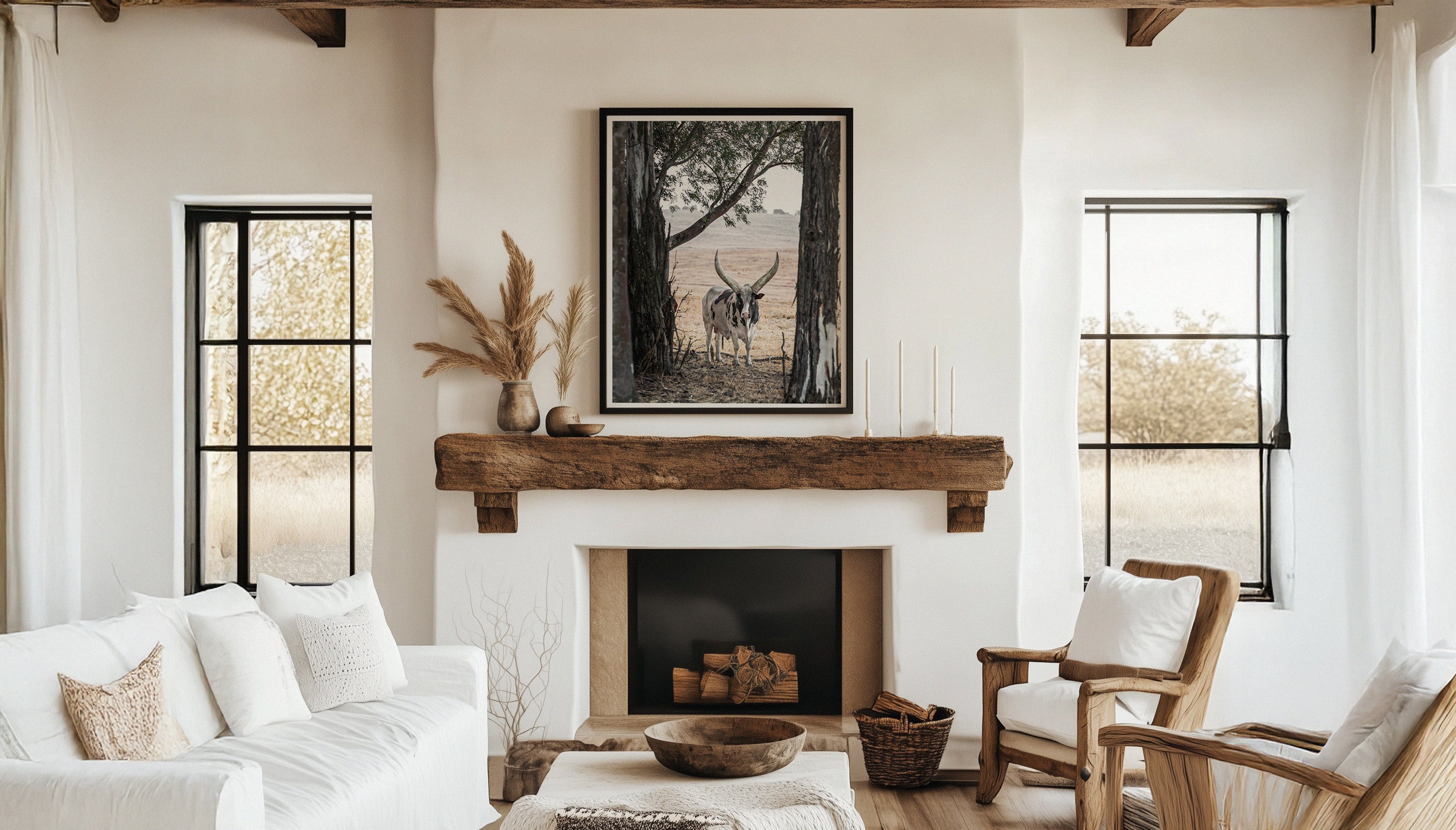 An African styled living room with Charles Johnstone's DOZER print in a large black frame above the fireplace.