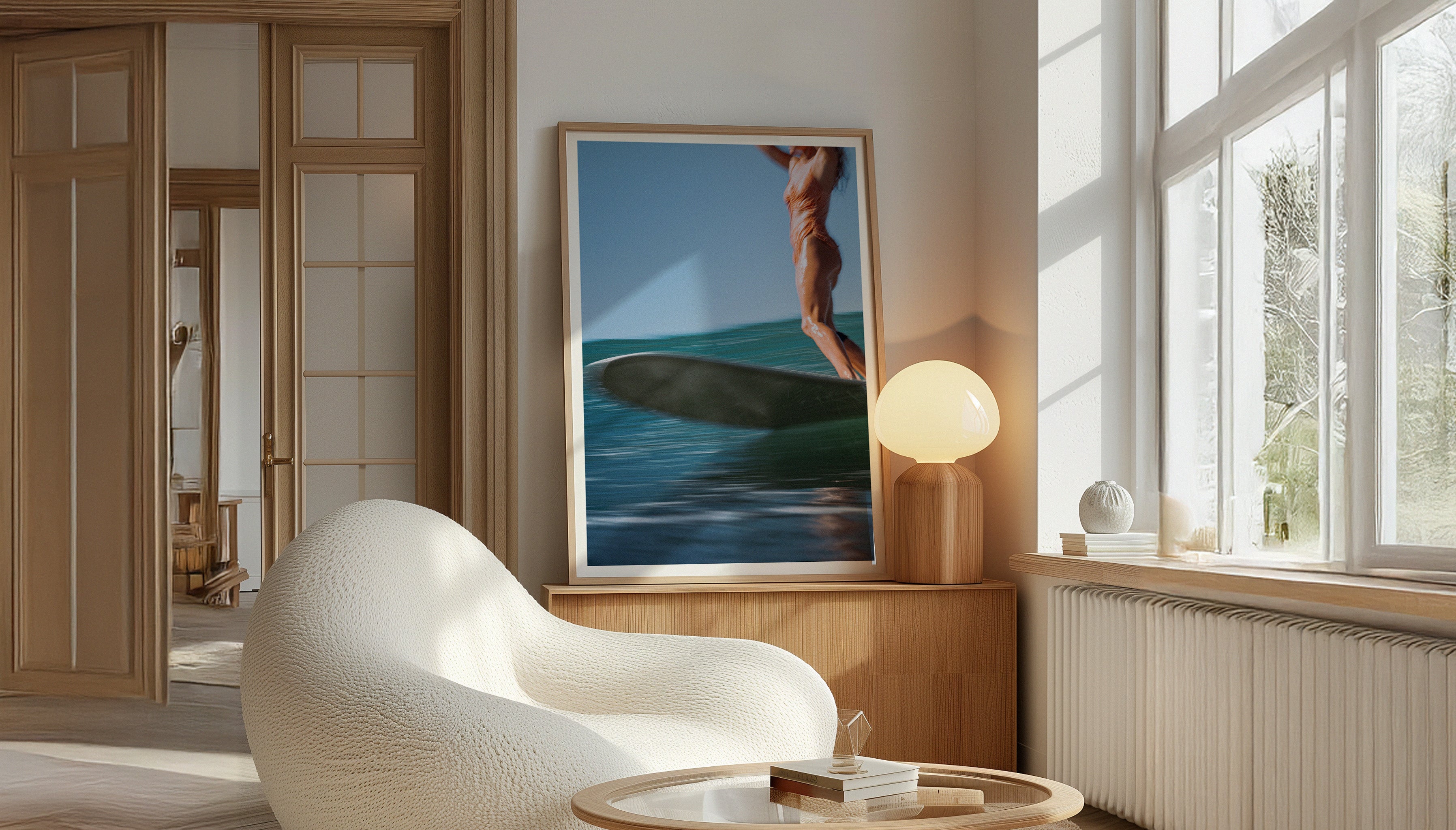 “Gliding” by Ez Rivero in a sunlit contemporary living room with wood accents and cozy minimalist furniture.