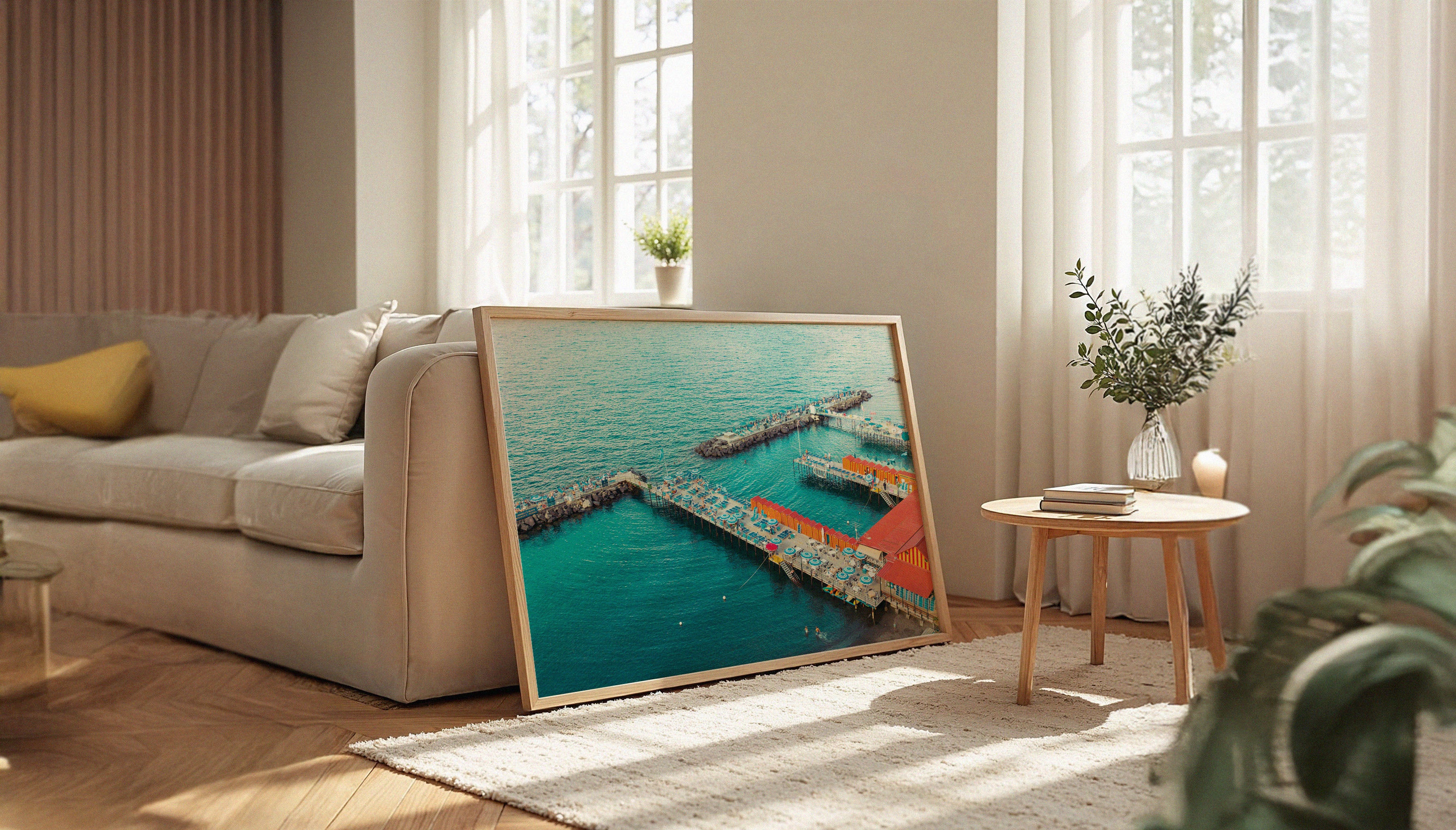 A photograph by Will Bremridge looking down to Marina Grande on the Amalfi Coast. The iconic blue of the Amalfi sea plays backdrop to playful red and yellow stripes. Available to purchase as a fine art print with free framing service from The Lost Works.