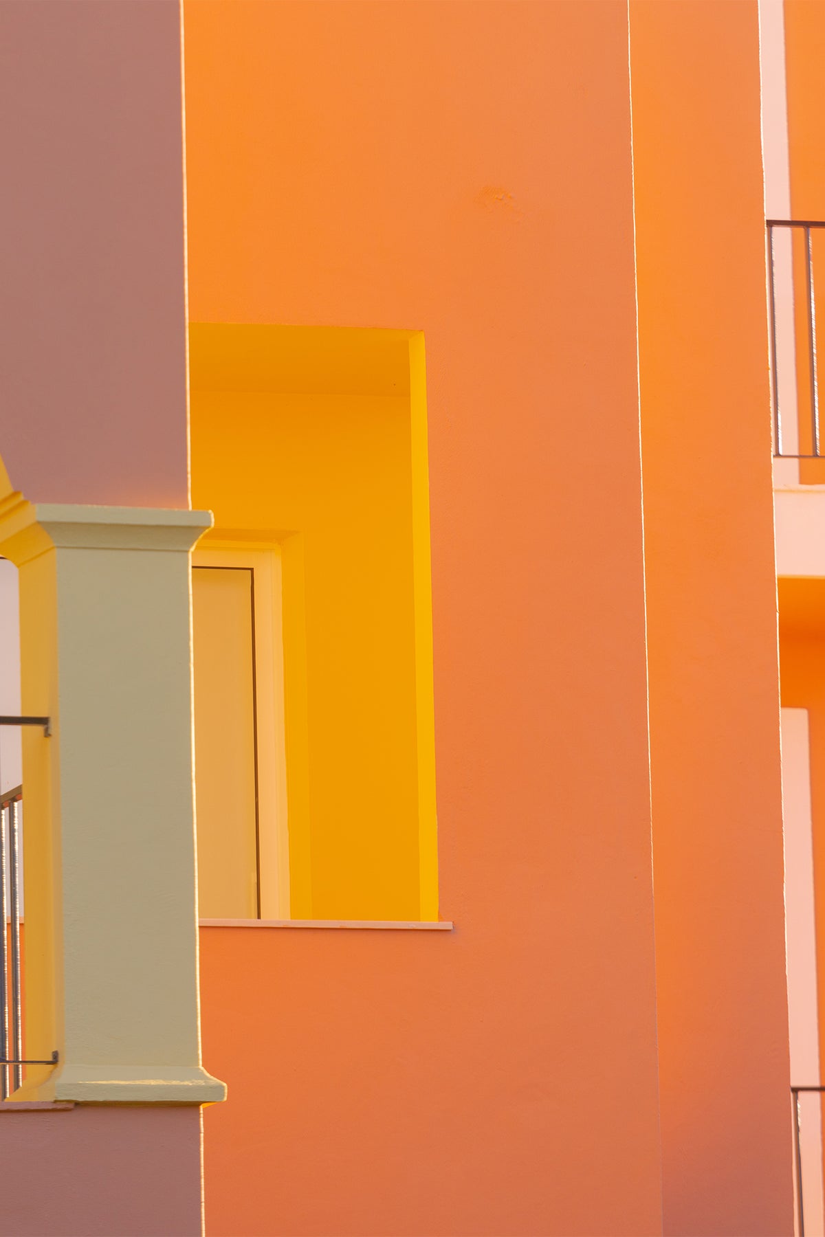 In the quiet neighbourhood of Lagos, a colourful apartment block stands bright and proud with muted oranges, yellows and a touch of sage green. Bring the vibrancy of the Algarve onto your wall with this fine art print by Will Bremridge.
