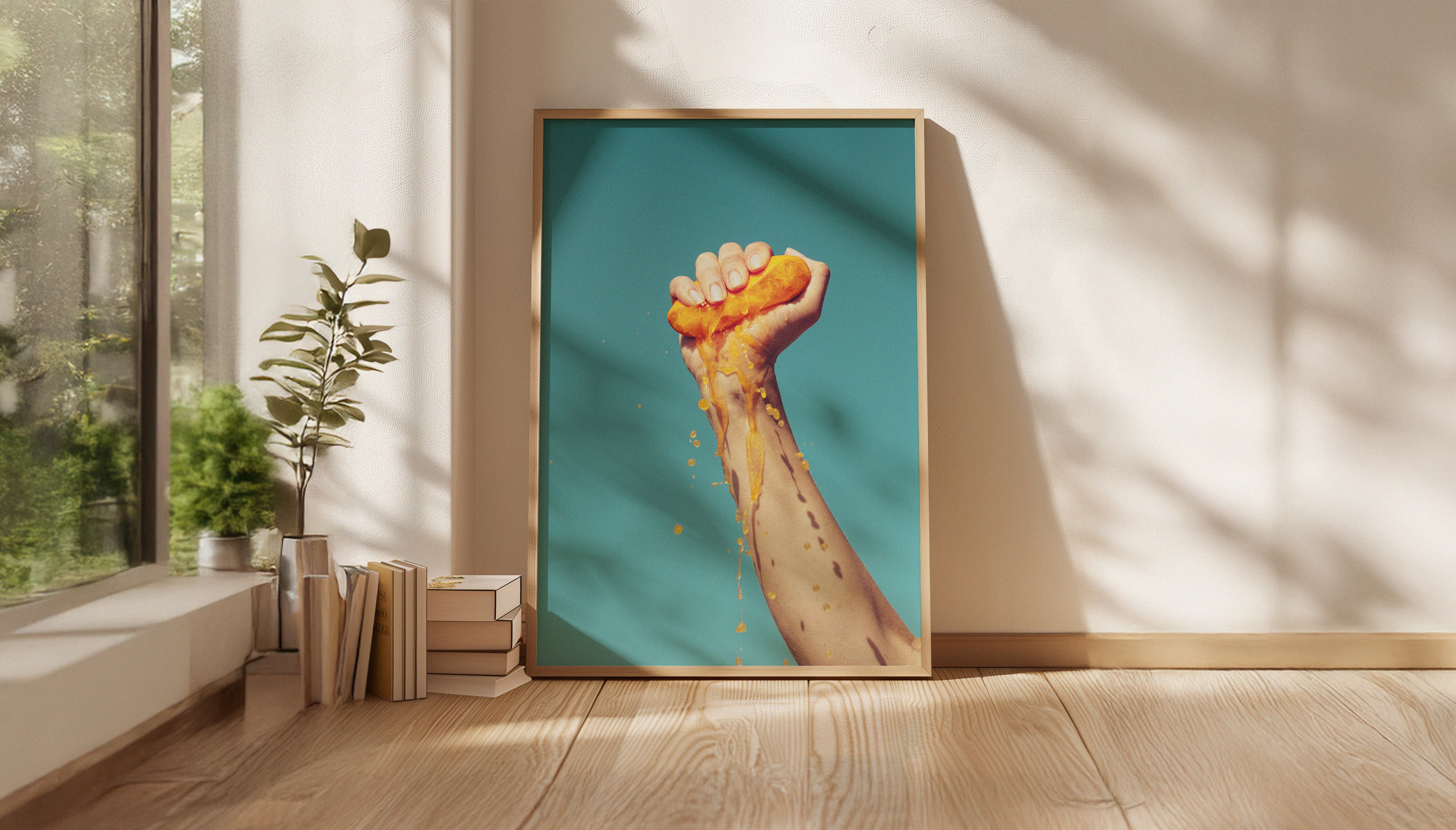 SQUEEZE by Evie Johnstone, a ready-to-hang framed photography print shown in a large wooden frame leaning against a white wall in minimalist interior.